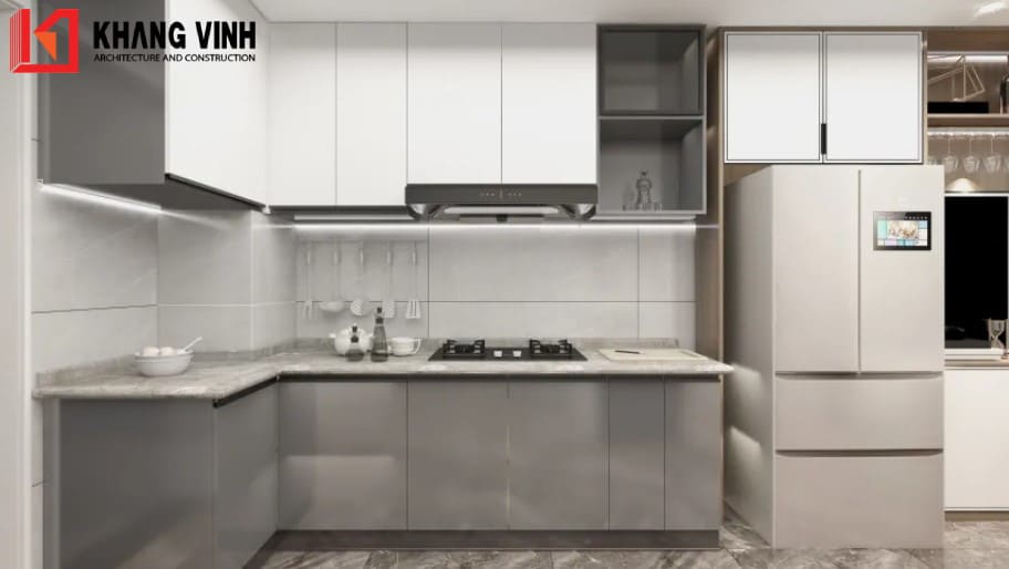 Bếp có màu chủ đạo xám tinh tế và sạch sẽ, mặt bếp được ốp đá tạo cảm giác sang trọng