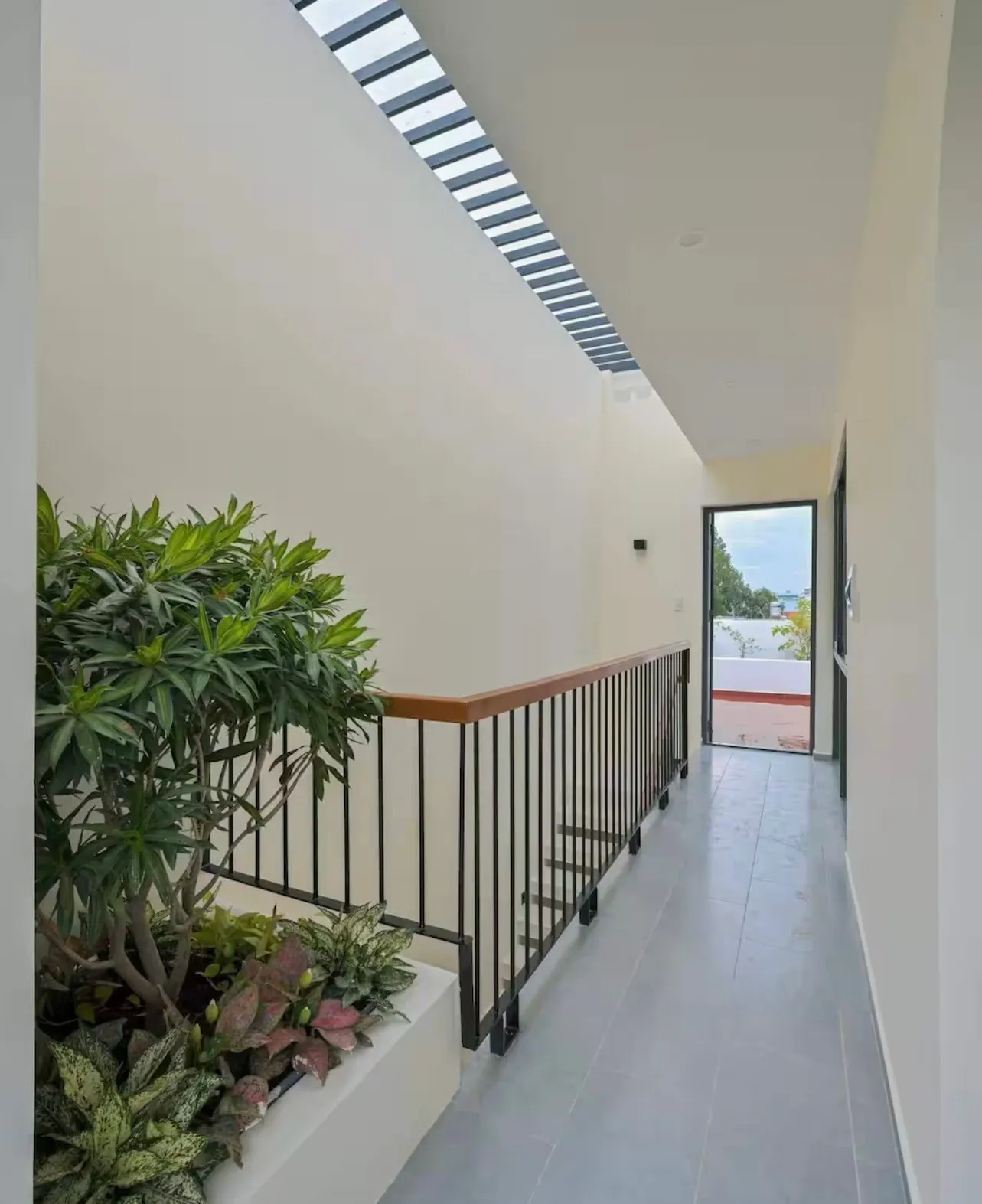 Giếng trời của thiết kế nhà phố 4 tầng với giếng trời thoáng đãng